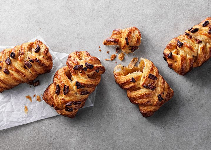 Schulstad Large Maple Pecan Plait Danish Pastries with sweet maple filling woven between layers of dough and finished with pecans