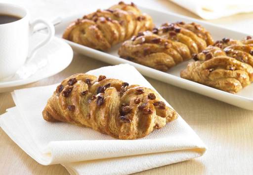 Schulstad Mini Maple Pecan Plaits with sweet maple filling woven between layers of dough and finished with pecans & maple glaze