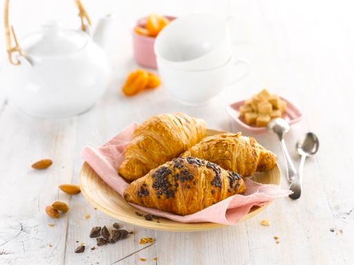 Schulstad Mini Assorted Filled Croissants featuring apricot filling, chocolate filling, and almond filling.