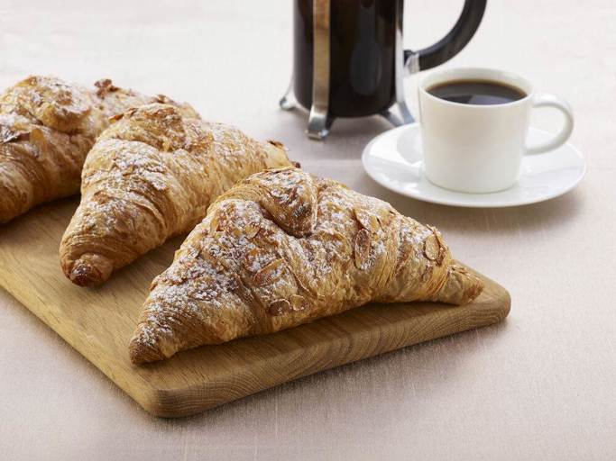 Schulstad Almond Filled Croissants made in Belgium with sweet almond paste filling and sliced almond topping adding texture to every bite